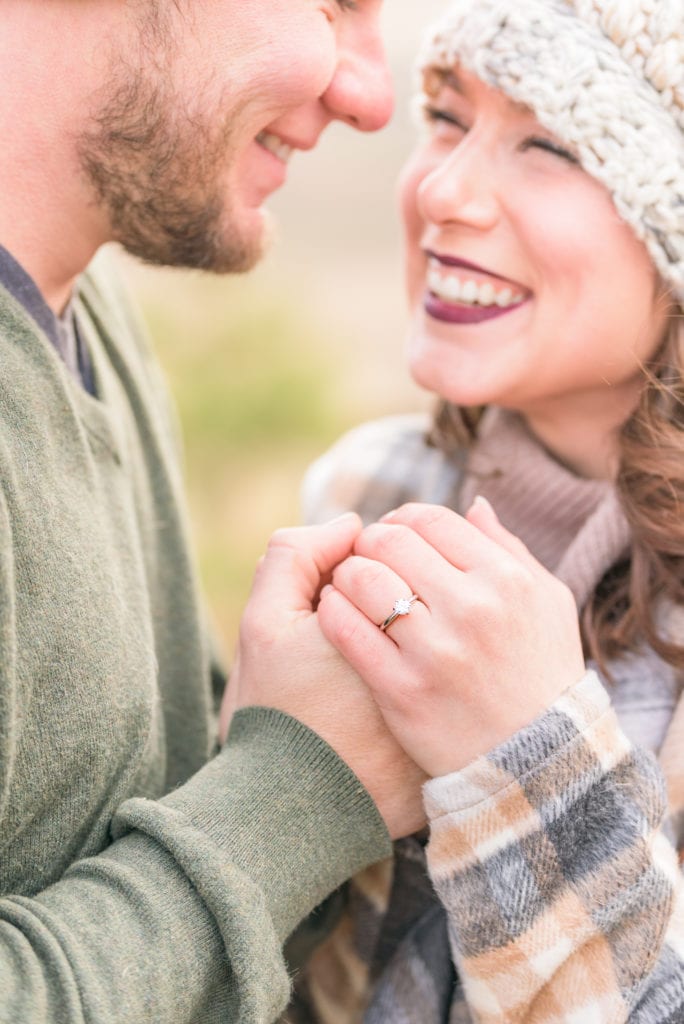 One of the best poses for engagement sessions shows off your engagement ring.