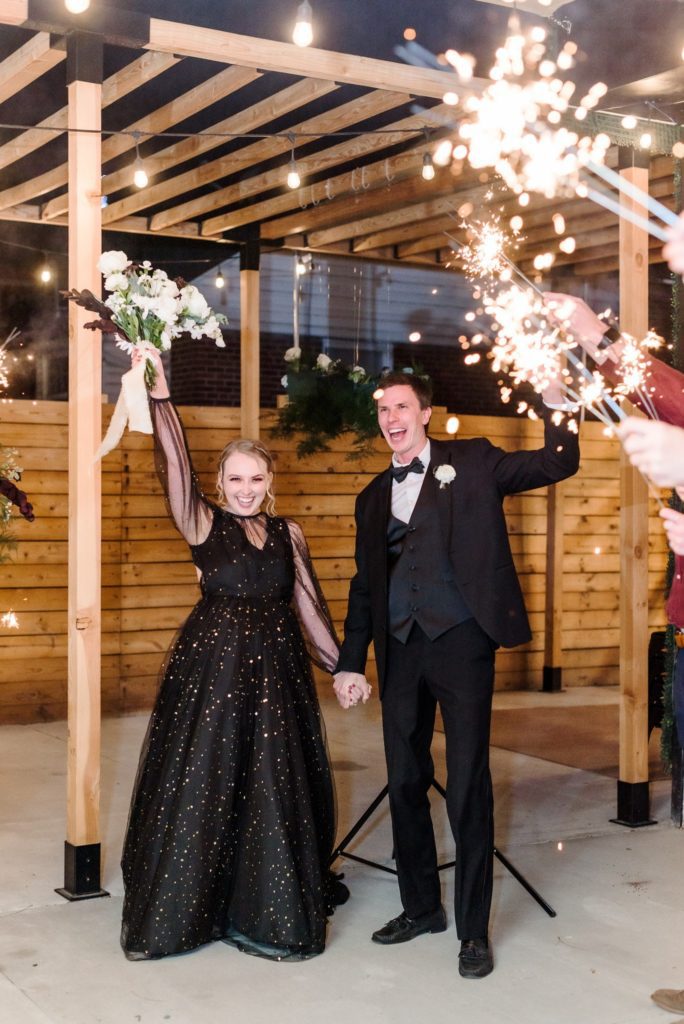 This bride and groom decided to have a sparkler entrance to make the most out of their wedding reception timeline.