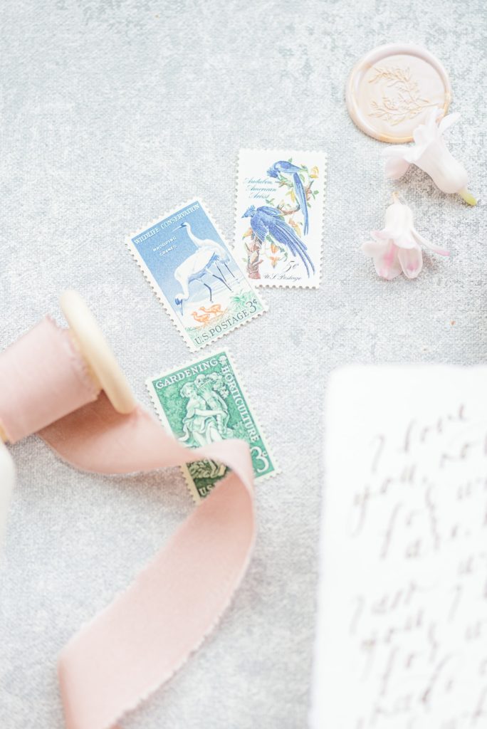 Cute stamps are a great thing to have for wedding invite photos.
