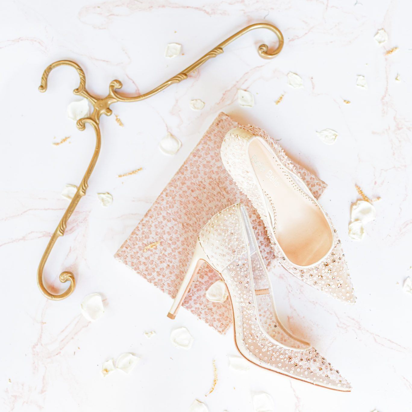 A pretty vintage hanger can be a great addition to your wedding invite photos.