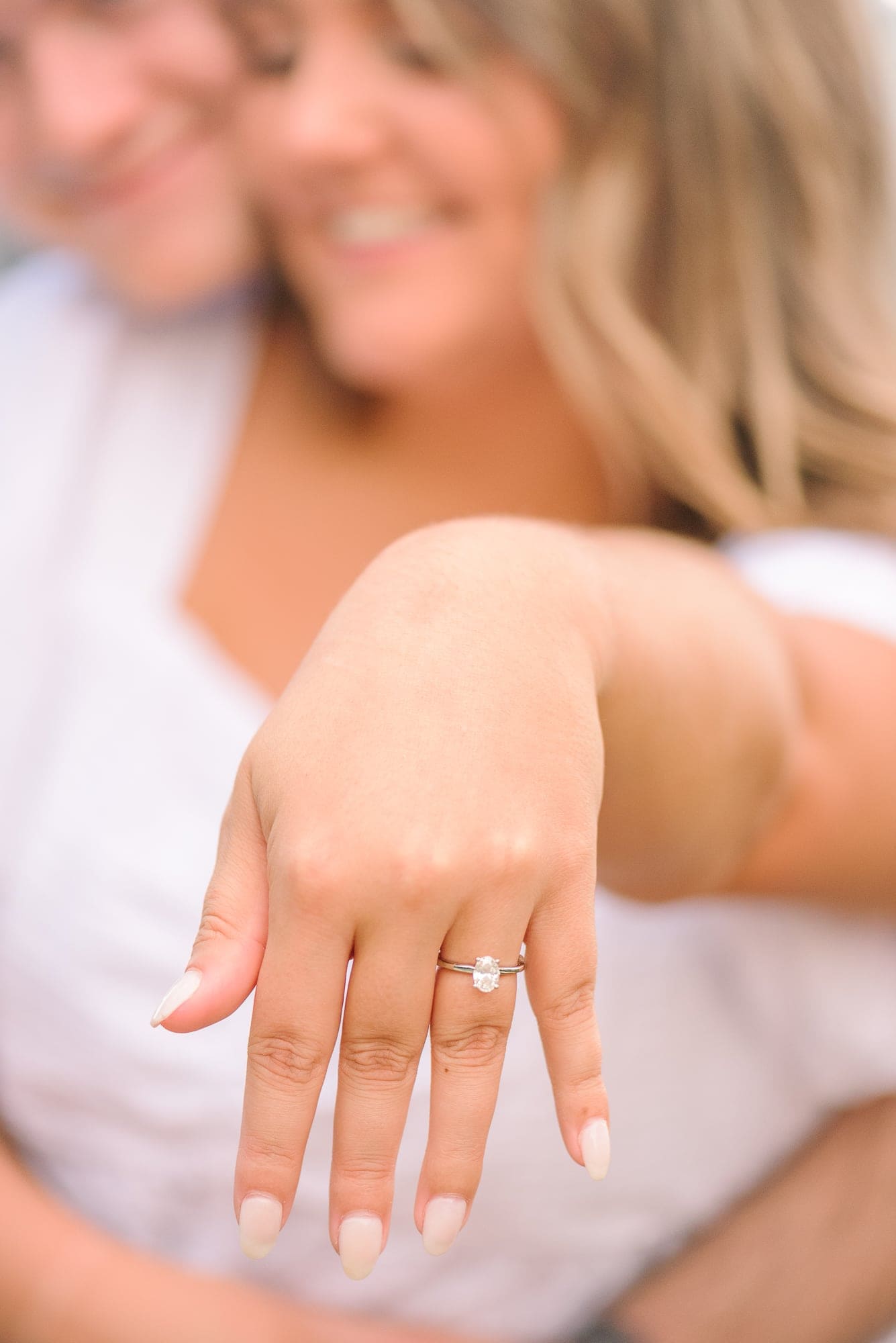 Hannah shows off her ring to the camera during their North Carolina mountain engagement photos.
