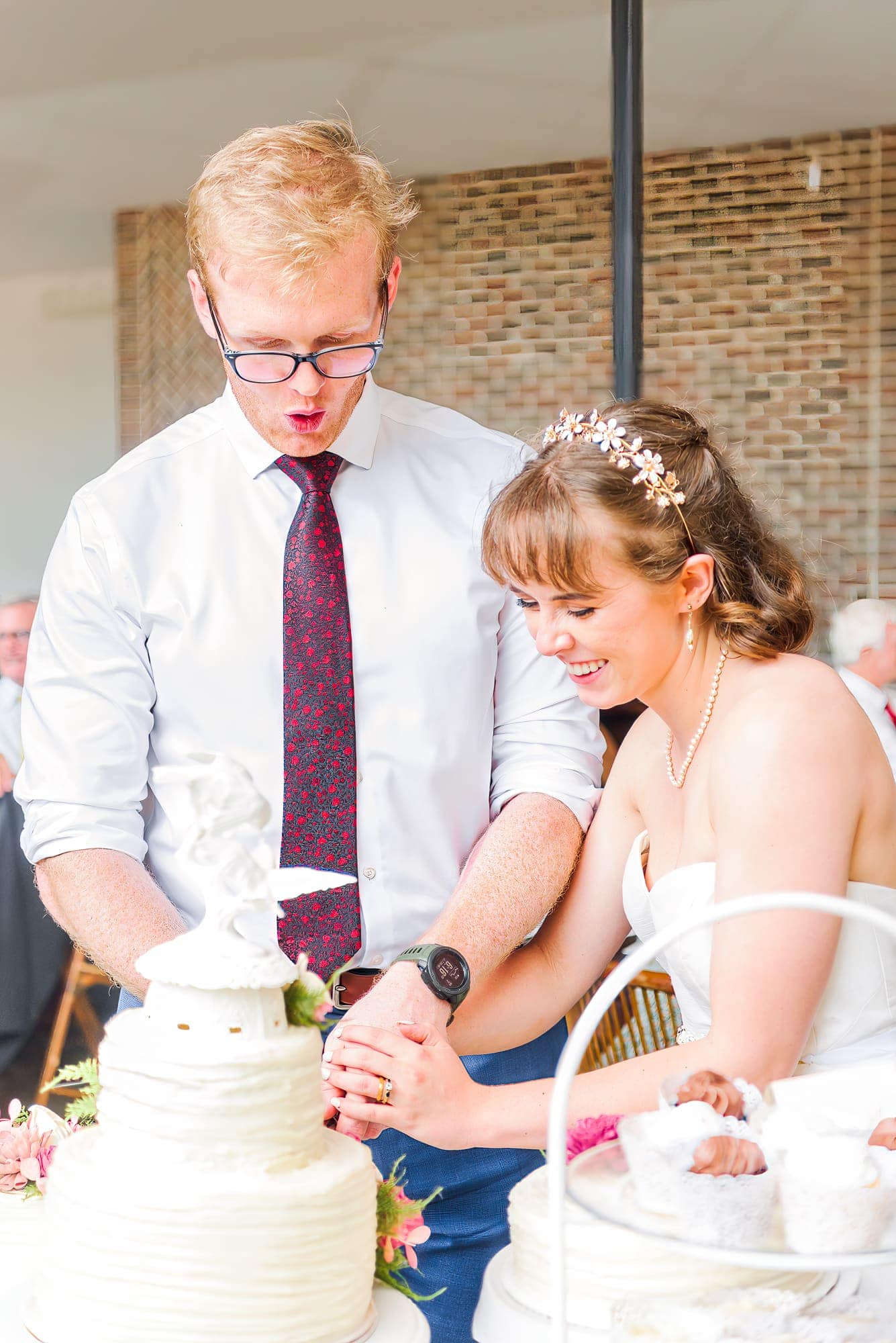 Cutting the cake is a classic tradition for any wedding at Delaney Ridge.