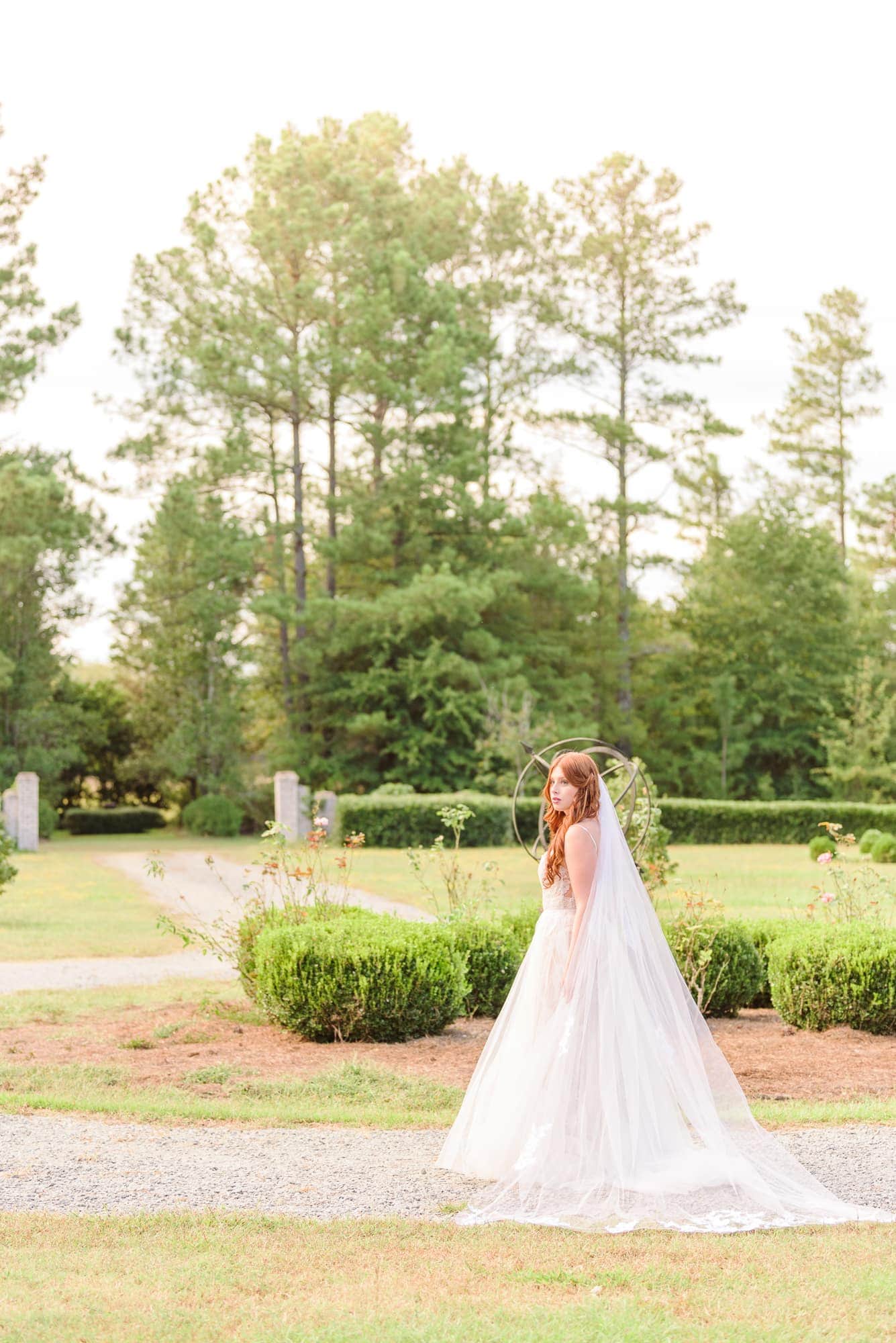 You can see the driveway entrance to the Key Rose Estate Venue in Fayetteville as Olivia walks the grounds.