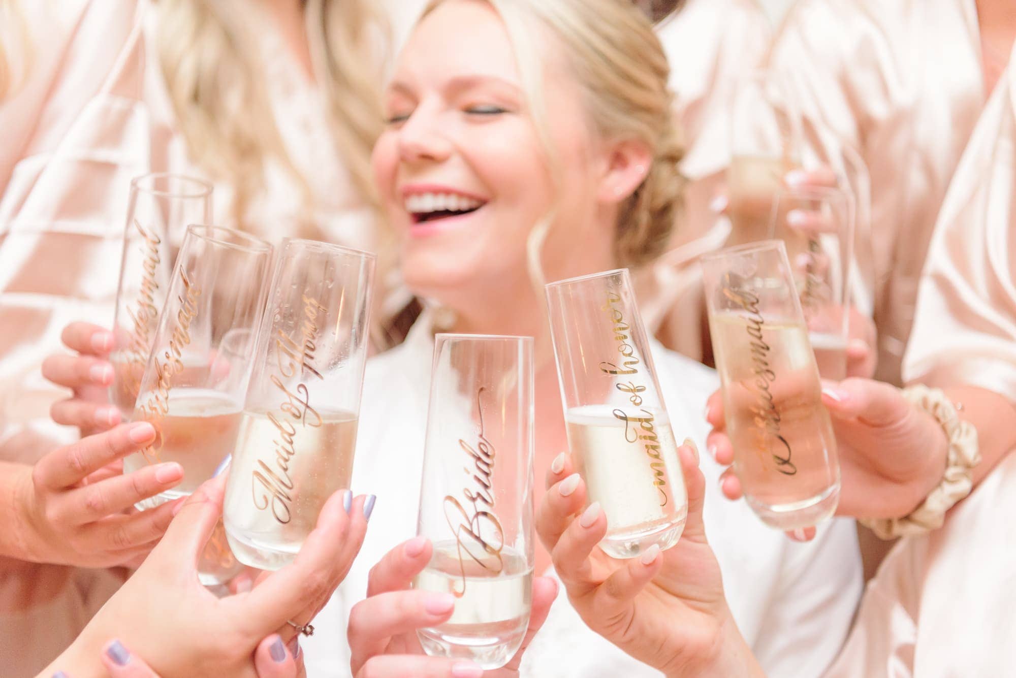 Charlotte's Longview Country Club was able to host this cute bride, who gifted custom champagne glasses to her bridesmaids.