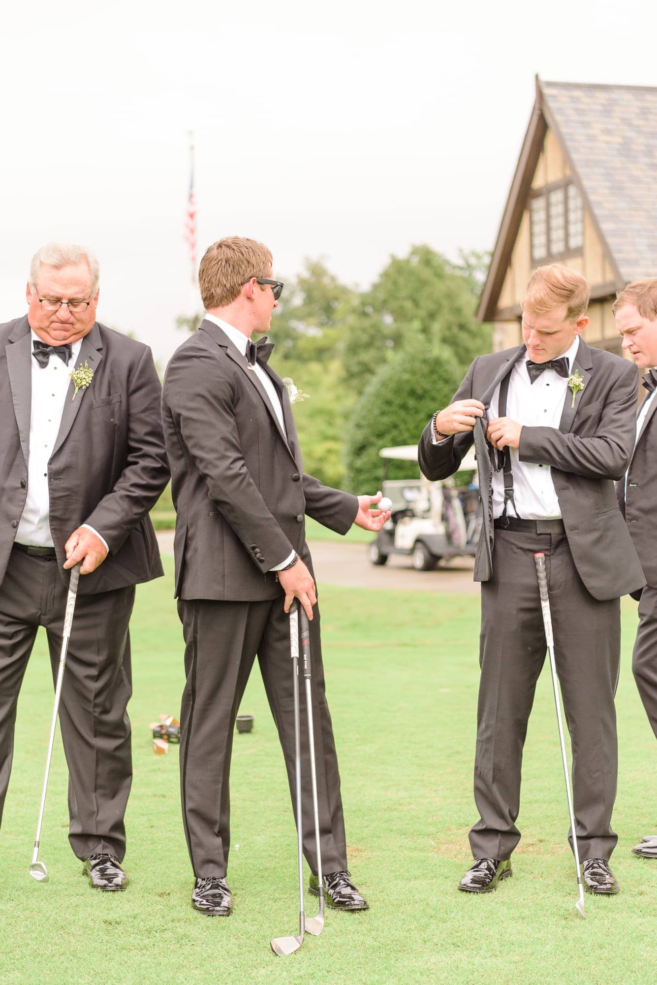 The groom practices his golf swings before his reception at the Longview Country Club in Charlotte starts.