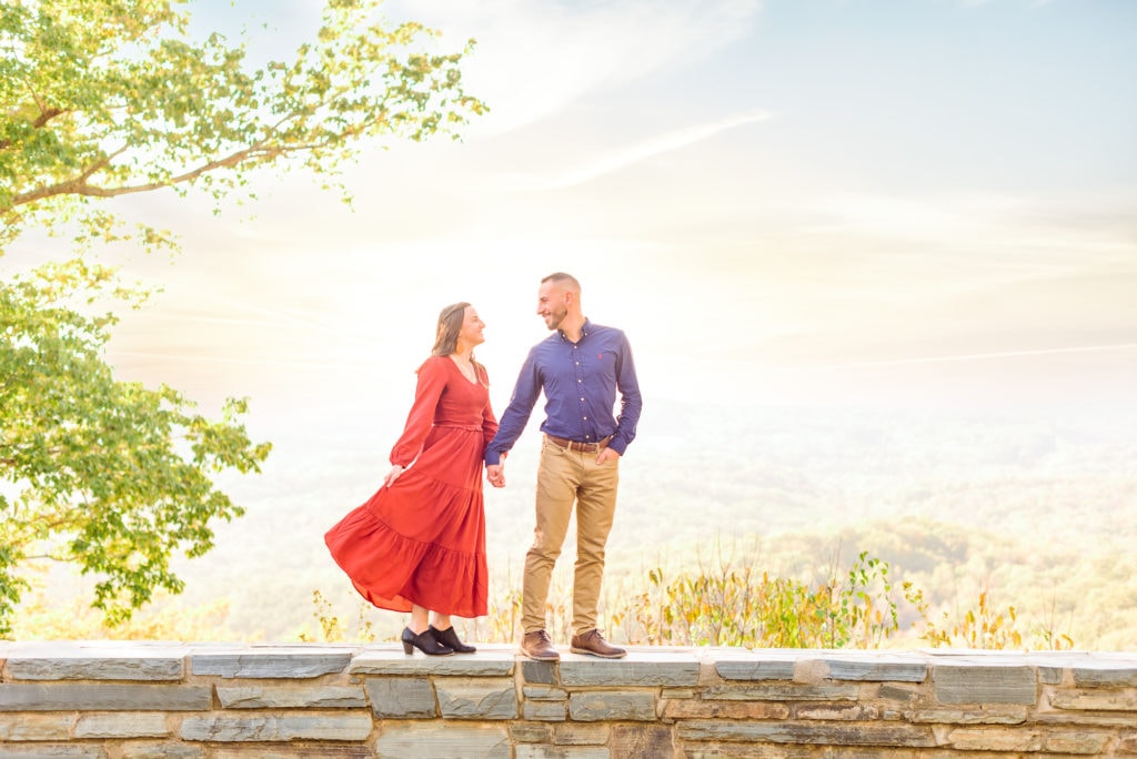 There's still some green on the trees for these fall engagement photos.