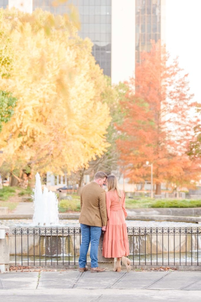 These city engagement photos in Charlotte had the perfect blend of fall colors and city vibes.