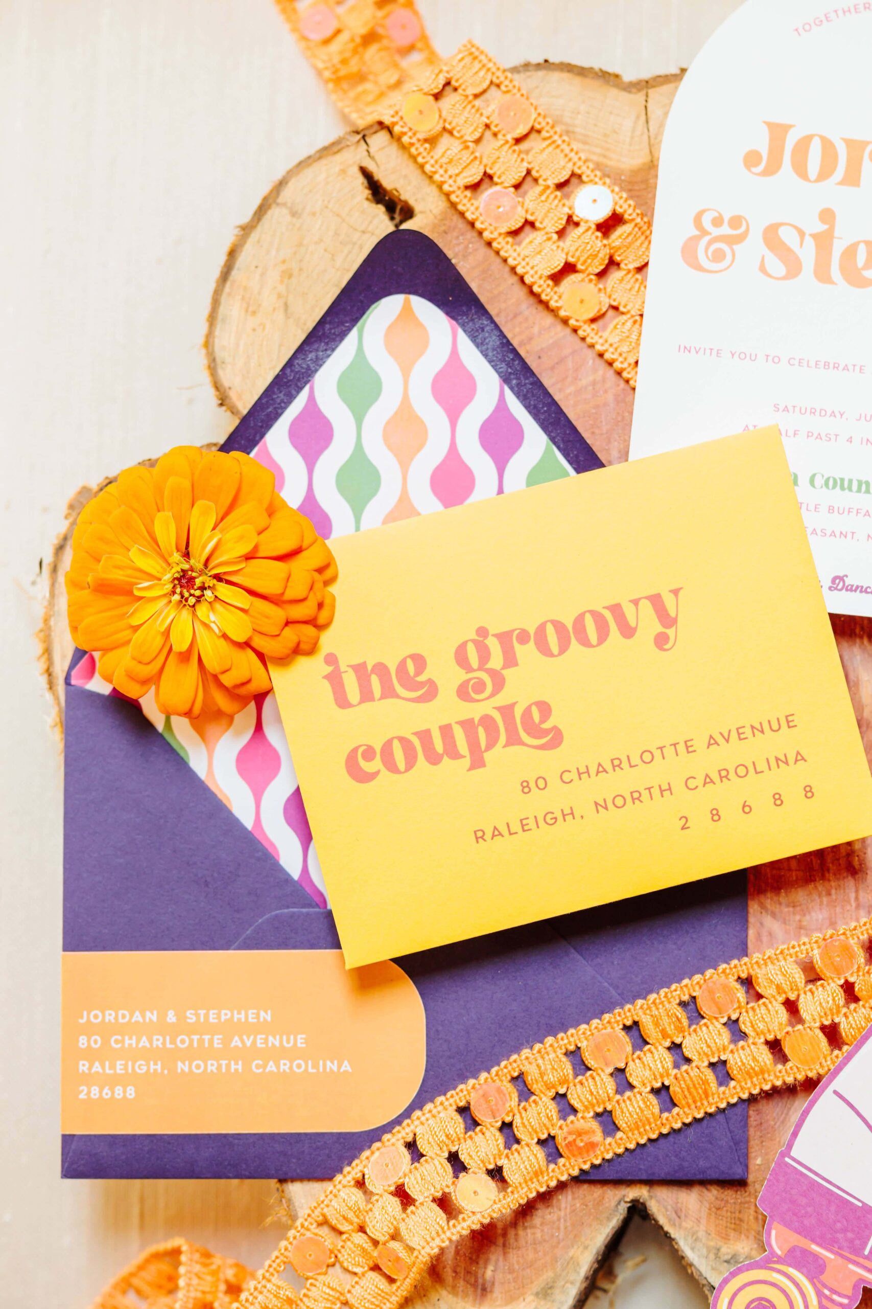 The wedding suite reads "the groovy couple" in a funky font with bright yellow, purple, and orange colors.
