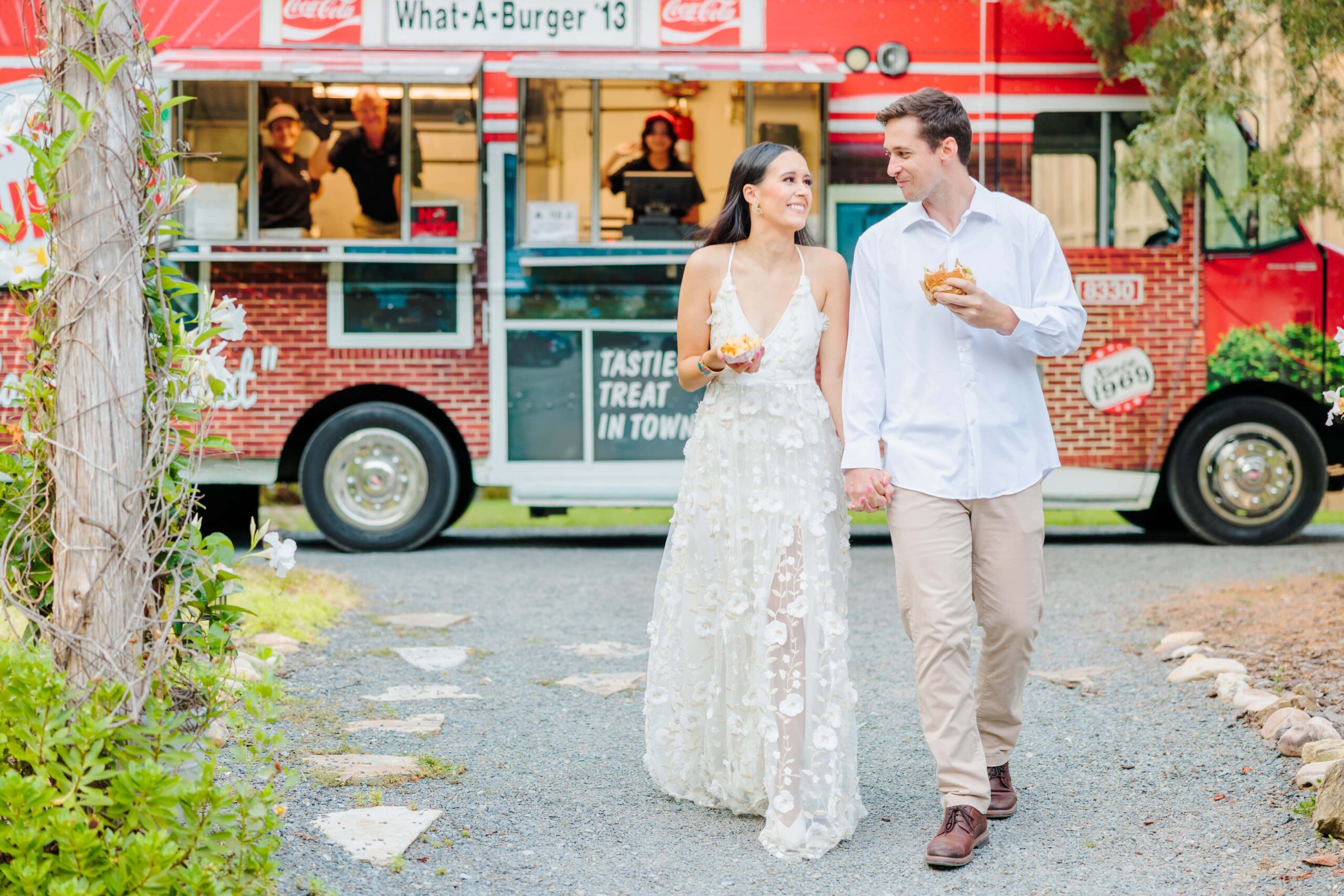 This retro disco wedding was catered by an old-timey red food truck serving hamburgers and fries.