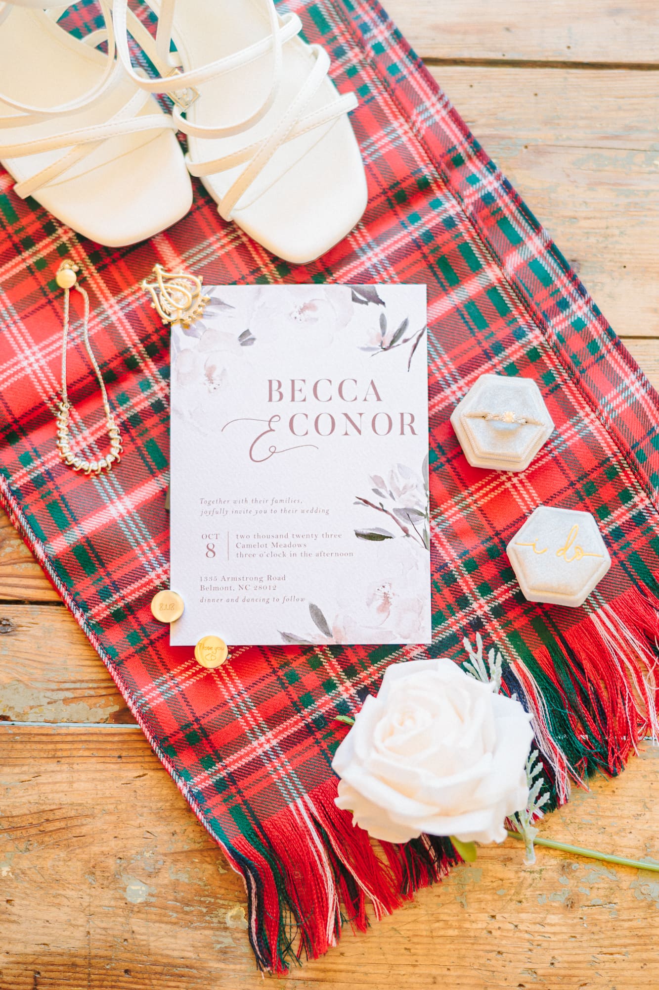 Becca and Conor's wedding invitation inviting guests to their barn wedding venue.