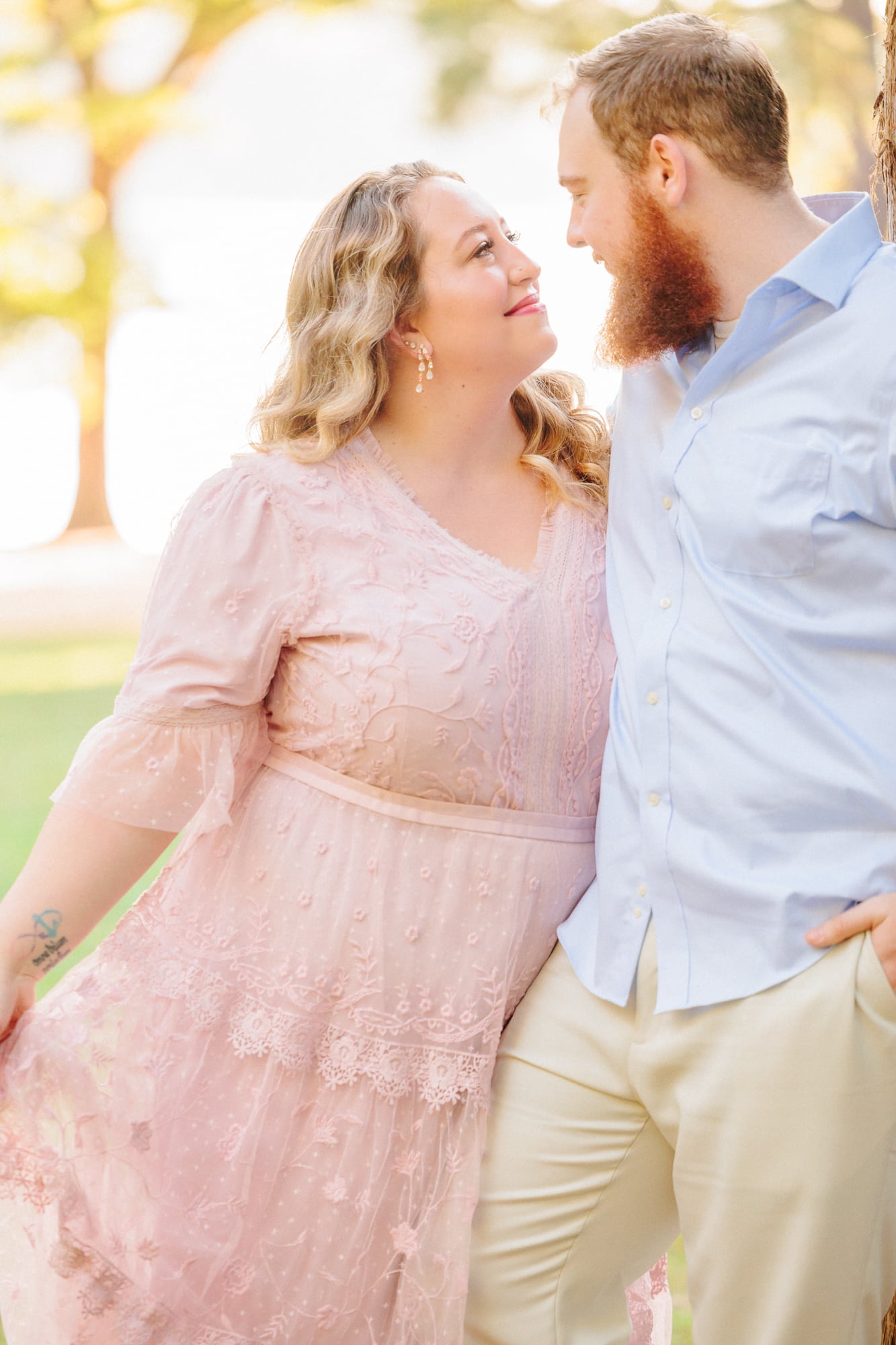 Shelby and Shawn hold each other close during their engagement photos in Huntersville, NC.