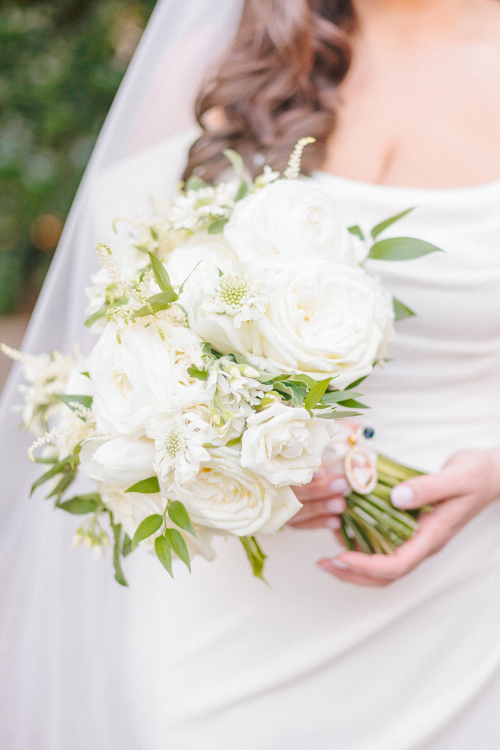 A simple white rose bouquet perfectly fit the Duke Mansion's elegant and classy vibe.