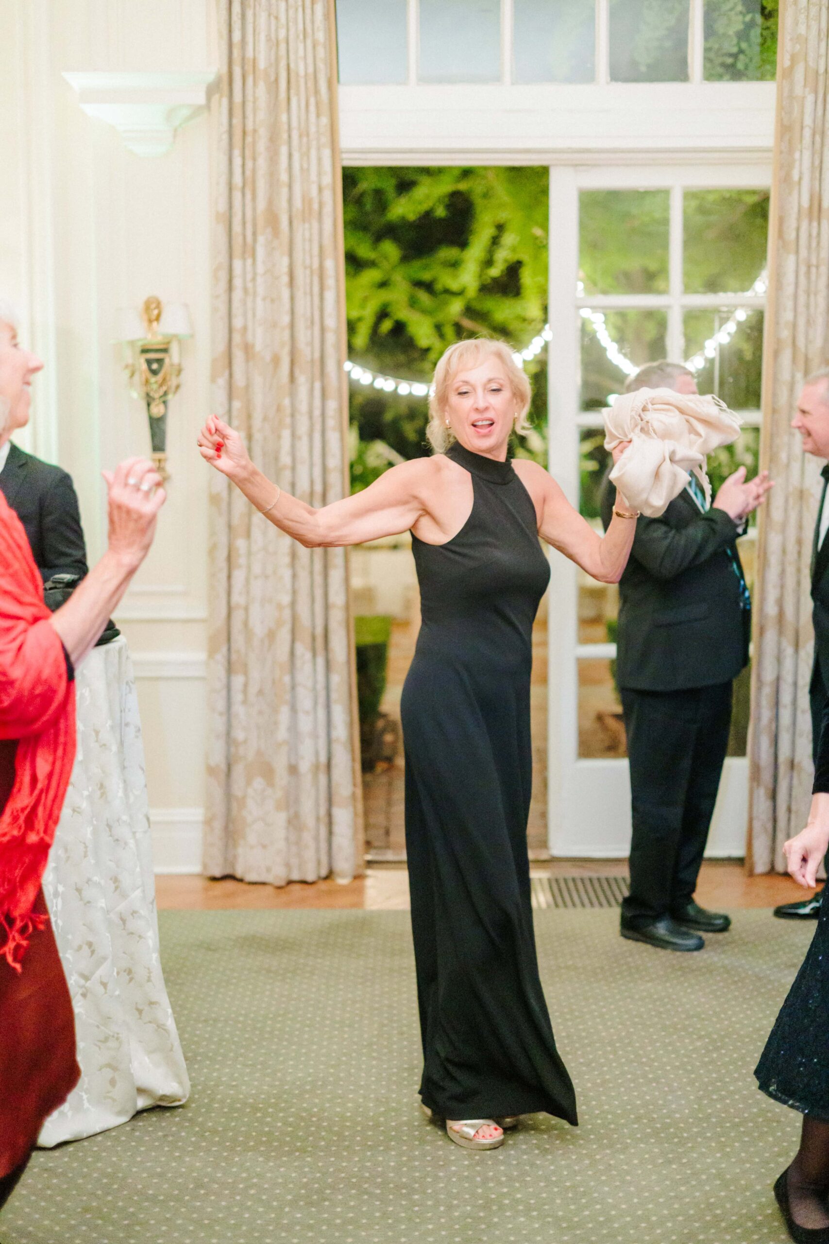 The bride's mom dances her heart out at their Duke Mansion wedding reception.